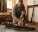 a man showing How to Store a Leather Rifle Case